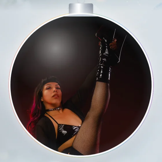 Holly Quinn, framed in a silver holiday ornament